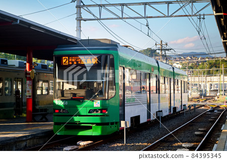 Hiroshima Electric Railway_Hiroden Miyajimaguchi Station Stopped Type 3950 84395345
