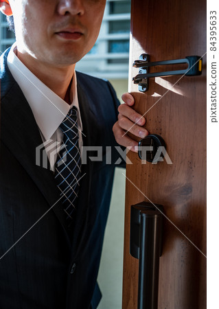 Front door businessman Front door businessman 84395633