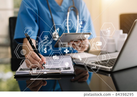 Medical technology concept. Doctor working with mobile phone and stethoscope and digital tablet laptop 84398295
