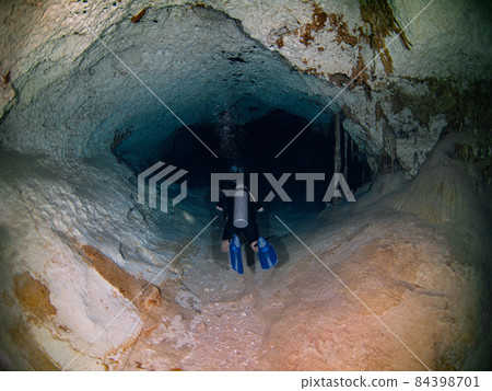 Scuba diving in the Underwater Cave (Cenote Dos Ojos, Tulum, Mexico) 84398701