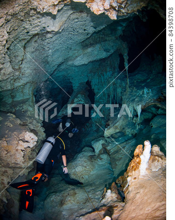 Scuba diving in the Underwater Cave (Cenote Dos Ojos, Tulum, Mexico) 84398708