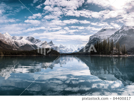 Canadian Rockies reflection on Maligne lake in Jasper national park, AB, Canada Canadian Rockies reflection on Maligne lake in Jasper national park, AB, Canada 84400817