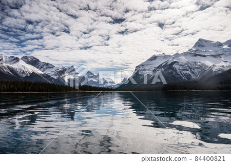 Canadian Rockies reflection on Maligne lake in Jasper national park, AB, Canada Canadian Rockies reflection on Maligne lake in Jasper national park, AB, Canada 84400821