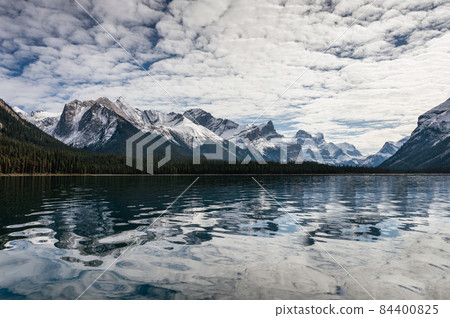 Canadian Rockies reflection on Maligne lake in Jasper national park, AB, Canada Canadian Rockies reflection on Maligne lake in Jasper national park, AB, Canada 84400825