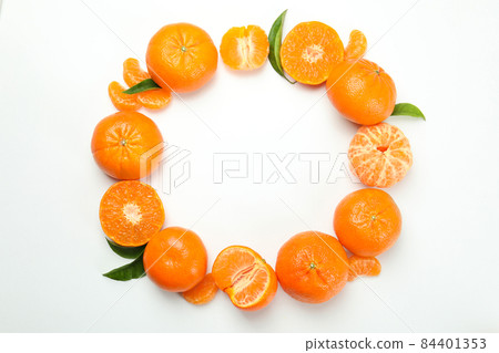 Circle of tasty mandarins on white background Circle of tasty mandarins on white background 84401353