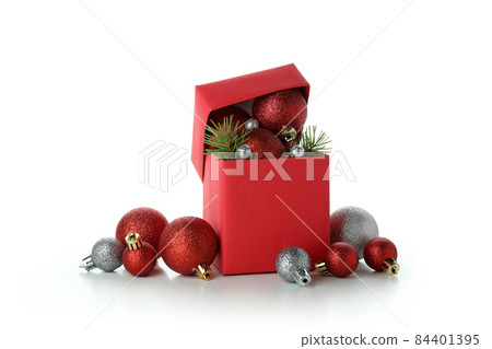 Christmas boxes with baubles isolated on white background Christmas boxes with baubles isolated on white background 84401395