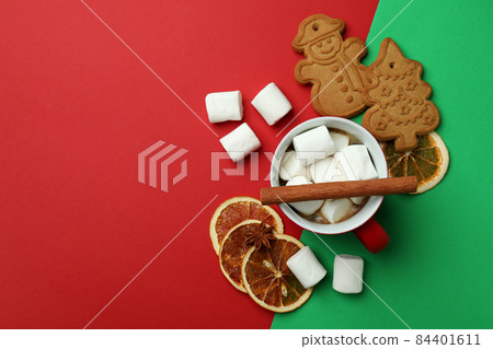 Different Christmas accessories on two tone background 84401611