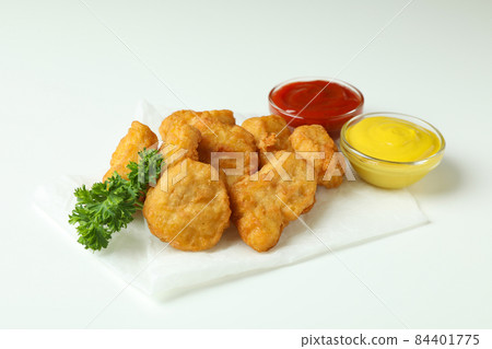 Concept of tasty eating with fried chicken on white background Concept of tasty eating with fried chicken on white background 84401775