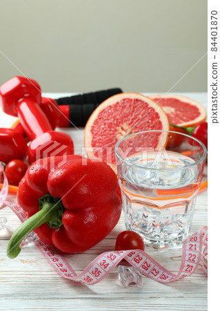 Healthy lifestyle accessories on white wooden table Healthy lifestyle accessories on white wooden table 84401870