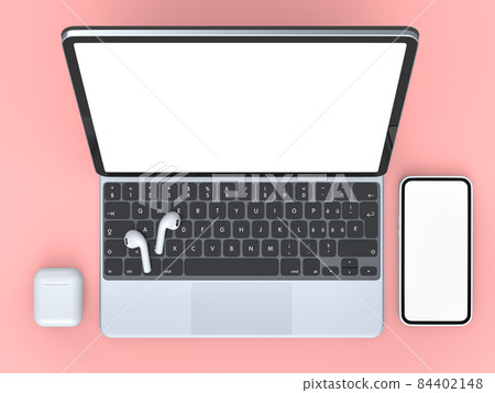 Aluminum laptop with mobile phone headphones on pink background 84402148