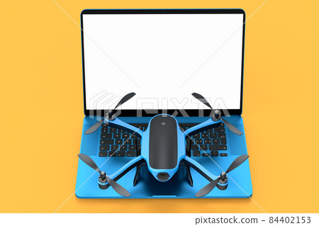 Top view of workspace and photography gear like laptop and drone on yellow Top view of workspace and photography gear like laptop and drone on yellow 84402153