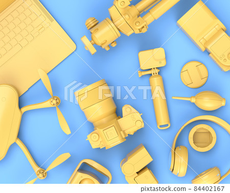 Top view of designer workspace and photography gear on blue table background 84402167