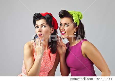 Beautiful women talking . Beautiful women talking . 84402235