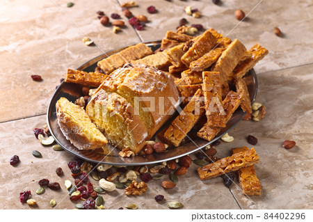 Cupcake with almond cookies , nuts and dried fruits 84402296