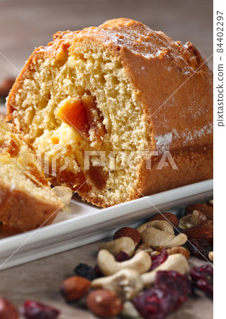 Cupcake with nuts and dried fruits Cupcake with nuts and dried fruits 84402297