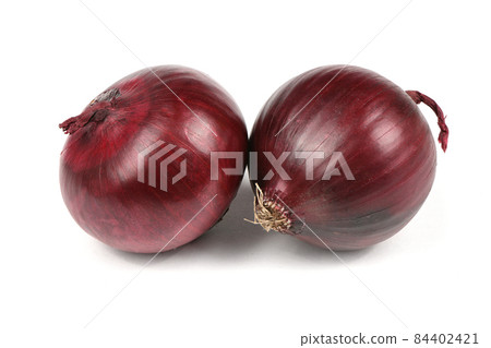 Red onion bulb isolated on white background. Red onion bulb isolated on white background. 84402421