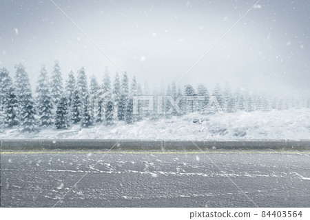 Empty road with snowy trees Empty road with snowy trees 84403564