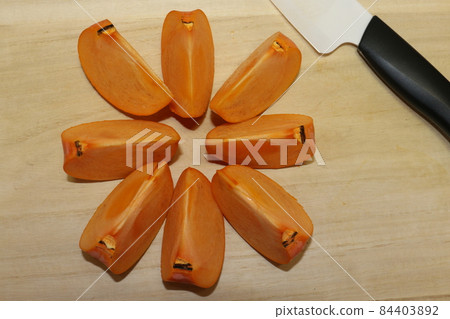 Cut persimmon 84403892