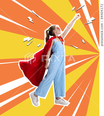 Contemporary art collage, creative design of little girl wearing red cloak and standing like superhero isolated over orange yellow background Contemporary art collage, creative design of little girl wearing red cloak and standing like superhero isolated over orange yellow background 84404172
