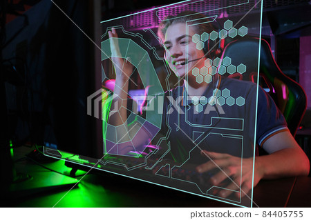 Professional young caucasian gamer playing online on his PC. He upset because of losing the game Professional young caucasian gamer playing online on his PC. He upset because of losing the game 84405755
