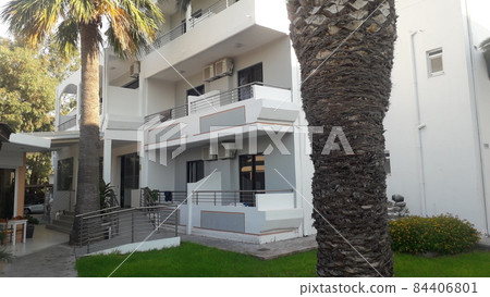 The architecture of a modern small hotel on the coast of the Aegean Sea 84406801