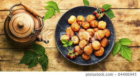 Curd donuts with raspberries for tea Curd donuts with raspberries for tea 84406945