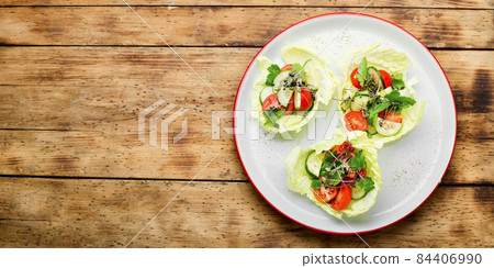 Spring vegetable salad on wooden table,summer food Spring vegetable salad on wooden table,summer food 84406990