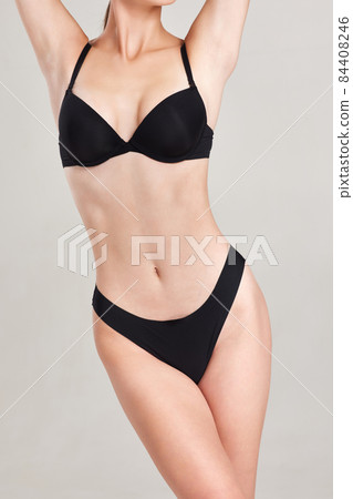 female body with well-kept skin in blackunderwear 84408246