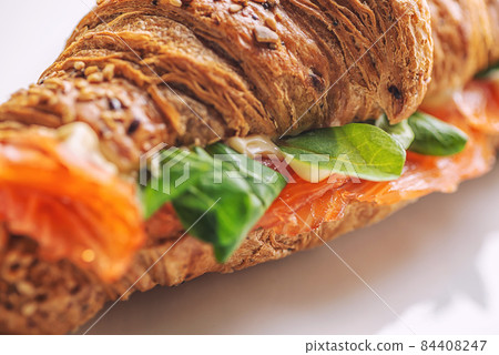 still life with croissant and coffee on a white background, product photo, savory breakfast and coffee break 84408247