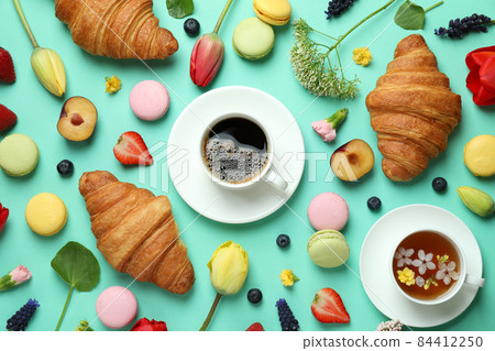 Concept of delicious eating on mint background, top view Concept of delicious eating on mint background, top view 84412250