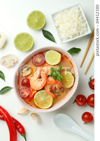 Tom yum soup and ingredients on white background 84412380