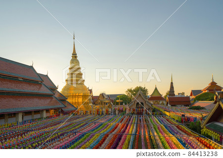 Colorful lanterns or lamps in travel trip and holidays vacation concept. Traditional festival in Harikulchai Temple, Lamphun, Thailand. Traditional ceremony in Asia. Celebration Colorful lanterns or lamps in travel trip and holidays vacation concept. Traditional festival in Harikulchai Temple, Lamphun, Thailand. Traditional ceremony in Asia. Celebration 84413238