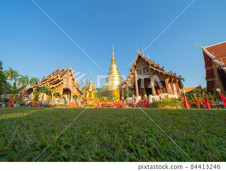 Wat Phra Singh Woramahawihan golden pagoda or stupa of buddhist Temple, Chiang Mai City, Thailand. Thai architecture. Tourist attraction landmark. 84413246