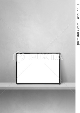 Digital tablet pc on grey wall shelf. Vertical background banner Digital tablet pc on grey wall shelf. Vertical background banner 84415424