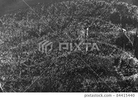 Grunge white color chalk texture on black board background Grunge white color chalk texture on black board background 84415440