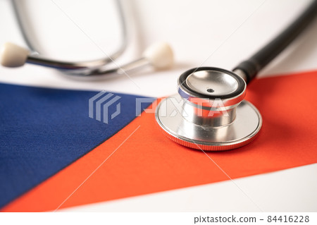 Black stethoscope on czech republic flag background, Business and finance concept. Black stethoscope on czech republic flag background, Business and finance concept. 84416228
