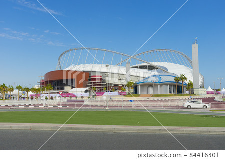 Entrance of Khalifa National Stadium against blue sky in Doha, Qatar 84416301