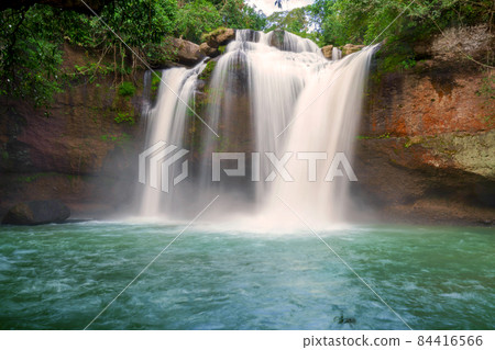 Beautiful waterfall with sunlight in jungle, Haew Suwat Waterfall at khao yai Nakhonratchasima province Beautiful waterfall with sunlight in jungle, Haew Suwat Waterfall at khao yai Nakhonratchasima province 84416566