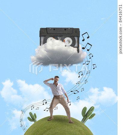 Contemporary art collage of artistic dancing man standing on green hill under playing music cassette isolated over blue background 84416751