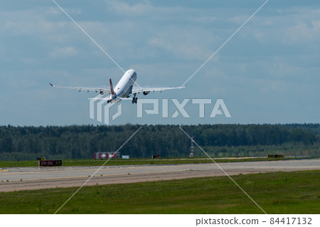 Airplane at the international airport Airplane at the international airport 84417132