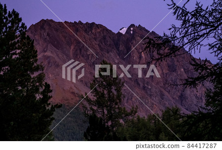 Mountain peak in the sunset light in the Altai Republic. Mountain peak in the sunset light in the Altai Republic. 84417287