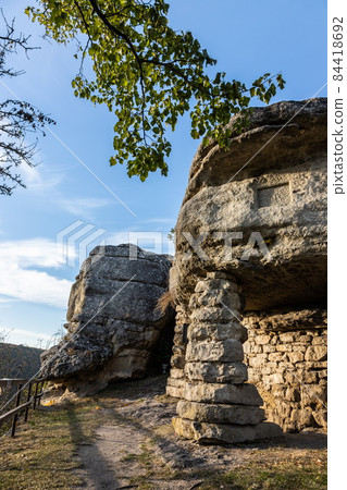 Cave-temple of pre-Christian time Pagan IX century in the village of Monastyrok in Ukraine Cave-temple of pre-Christian time Pagan IX century in the village of Monastyrok in Ukraine 84418692
