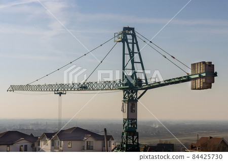New high rise tenement building construction a multi-storey building with tower cranes New high rise tenement building construction a multi-storey building with tower cranes 84425730