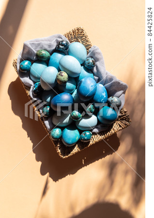Homemade naturally dyed eggs in blue colors Homemade naturally dyed eggs in blue colors 84425824