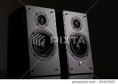 an image photograph of a pair of hi-fi level music speakers with two speakers on a black background an image photograph of a pair of hi-fi level music speakers with two speakers on a black background 84425907