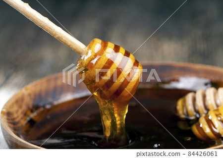 sweet and delicious natural honey, close up sweet and delicious natural honey, close up 84426061