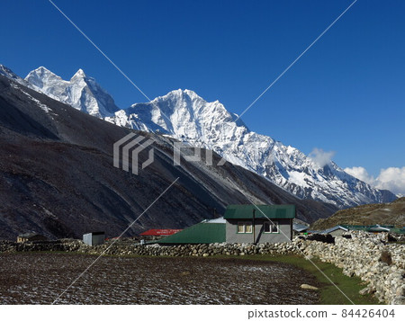 Morning in Dingboche, village near Mount Everest. Morning in Dingboche, village near Mount Everest. 84426404