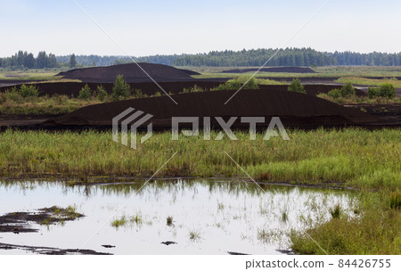 the flooded area where peat is extracted the flooded area where peat is extracted 84426755
