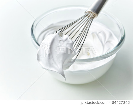 bowl of whipped egg whites cream 84427243
