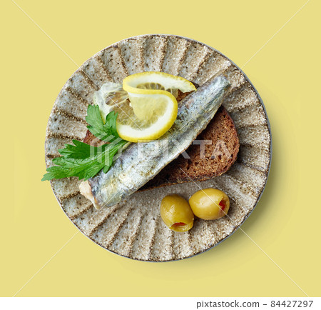 canned sardine on bread slice 84427297